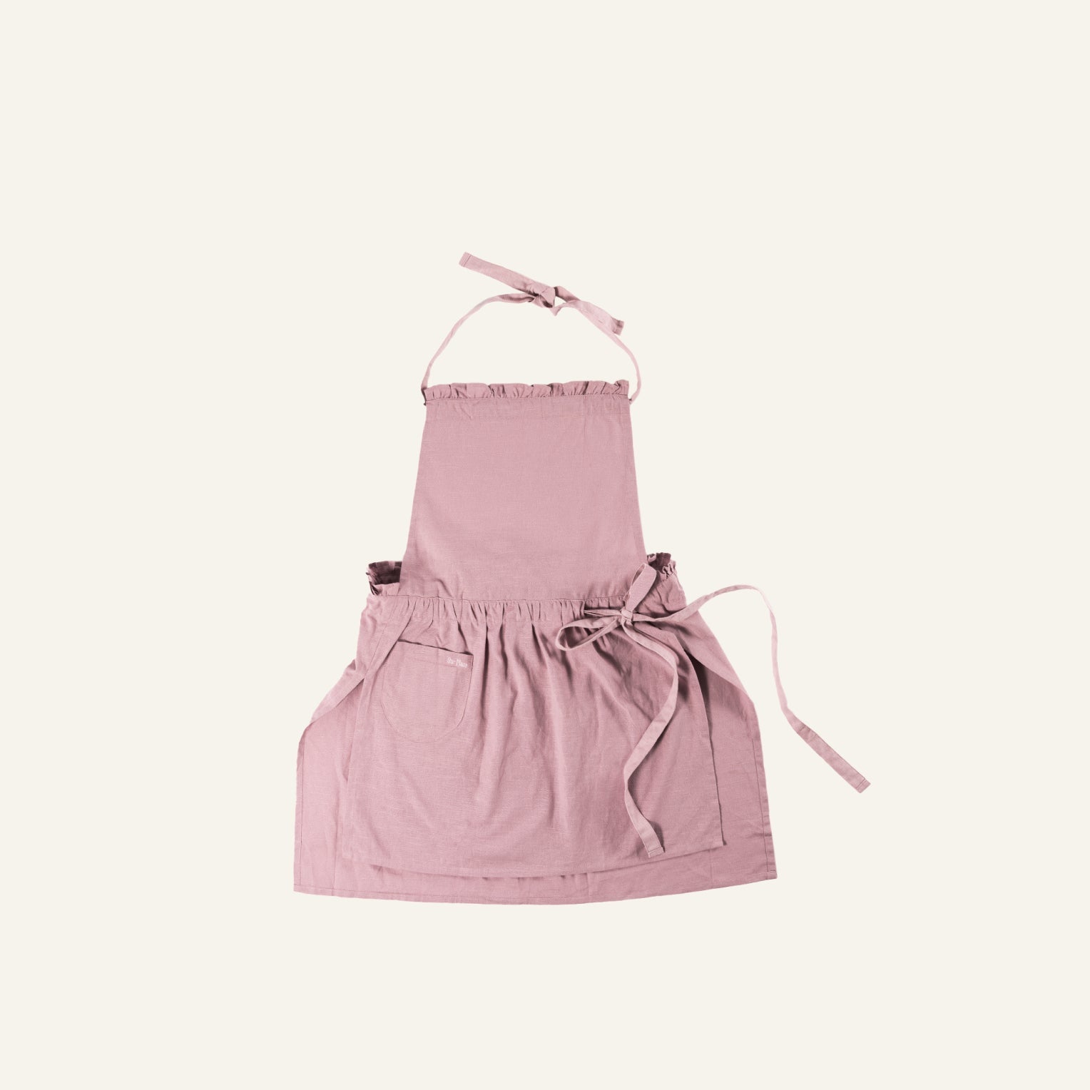 The Hosting Apron (Size 2) in pink, with a front pocket, neck strap, and waist ties, is displayed flat on a plain off-white background.