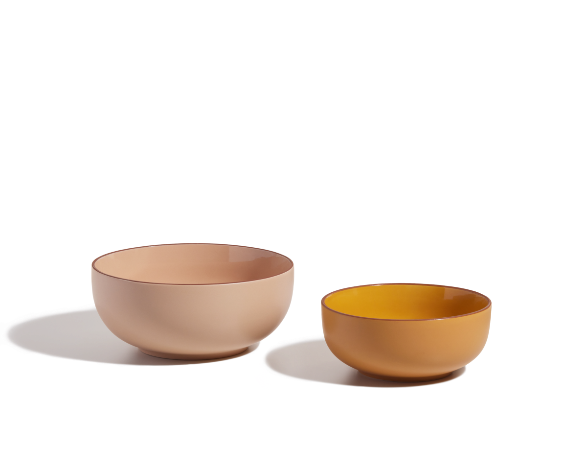 Two Serving Bowls—one large in beige, one small in mustard yellow—sit side by side on a white background. Ideal as stackable tableware for serving salads or snacks.