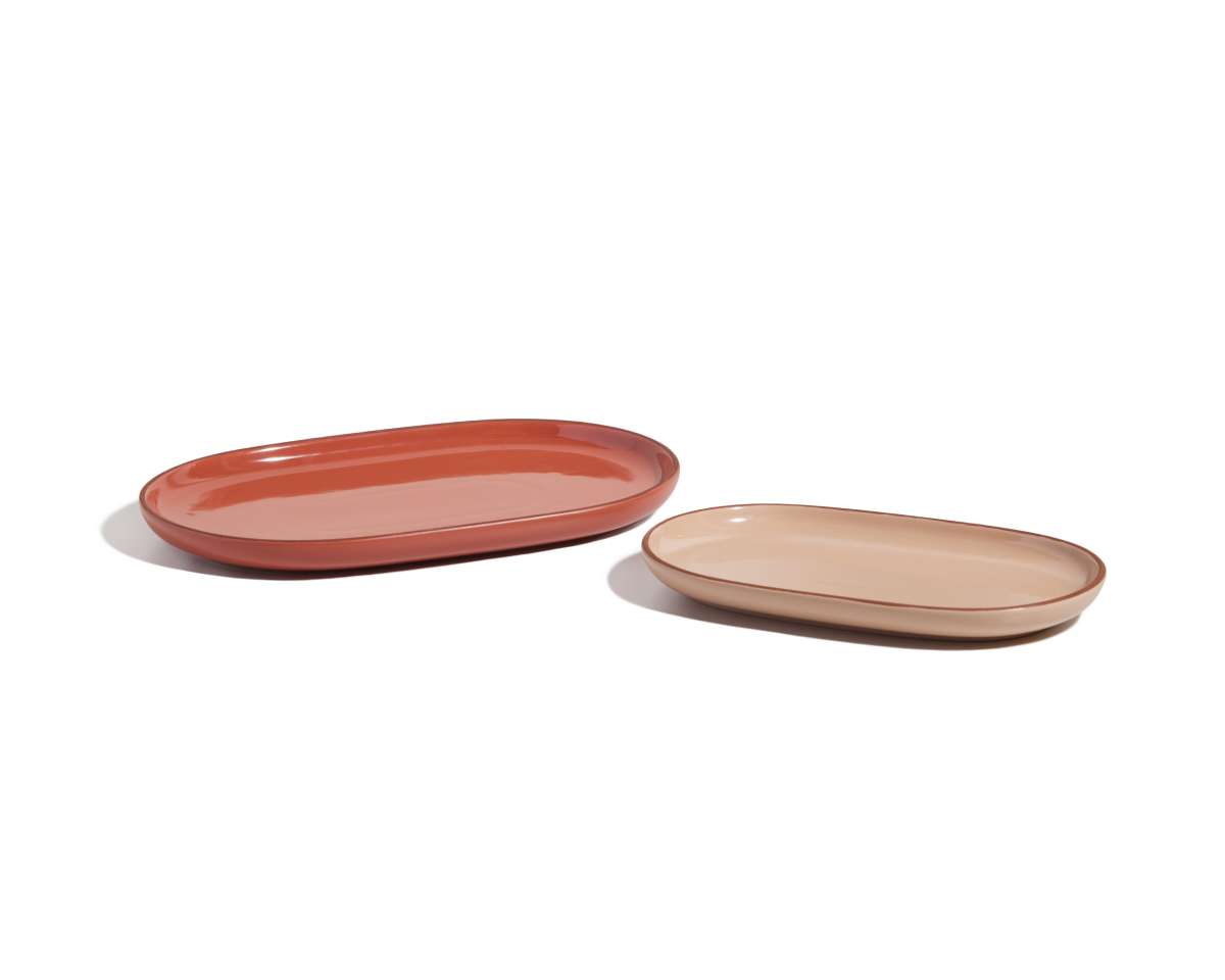 Serving Platters: Two oval ceramic pieces—one large reddish-brown, one small beige—placed side by side on a white background, ideal as stackable tableware for serving or display.