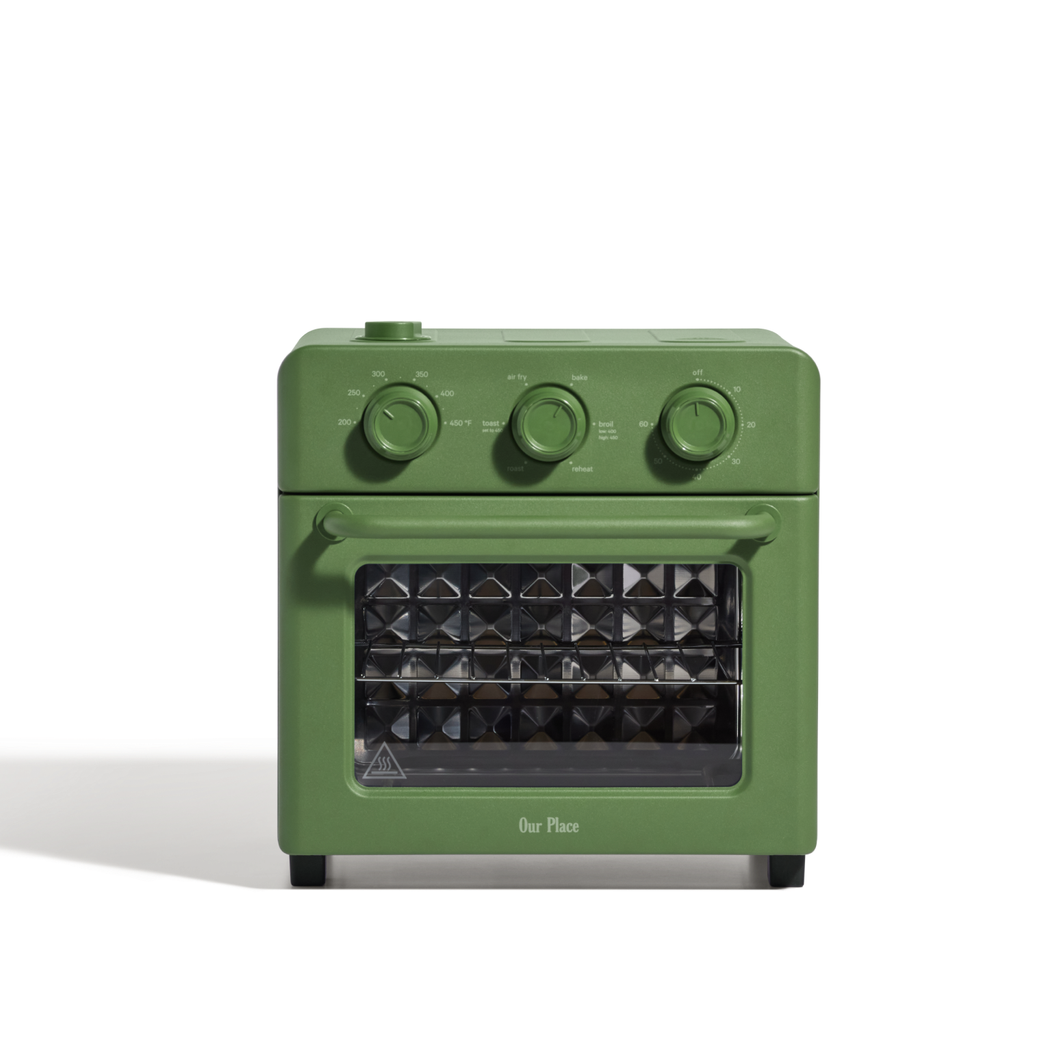 The AU - Wonder Oven is a compact green toaster oven with three dials on top and a glass door showcasing a diamond-patterned interior.