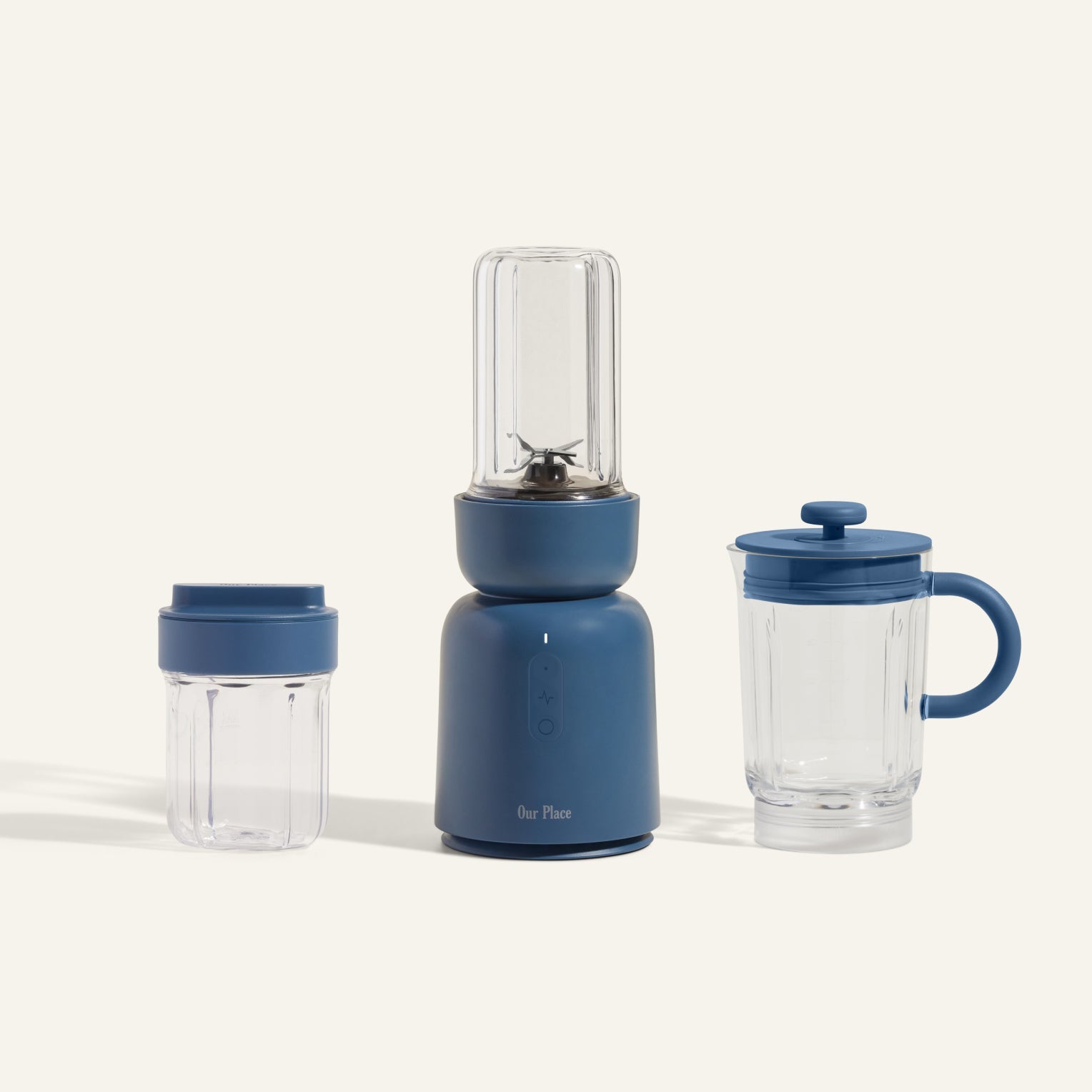 The Splendor Blender + Splendor Blender Everything Kit features a blue blender with a clear jar, plus an extra jar with lid and a lidded pitcher, shown on a neutral background.