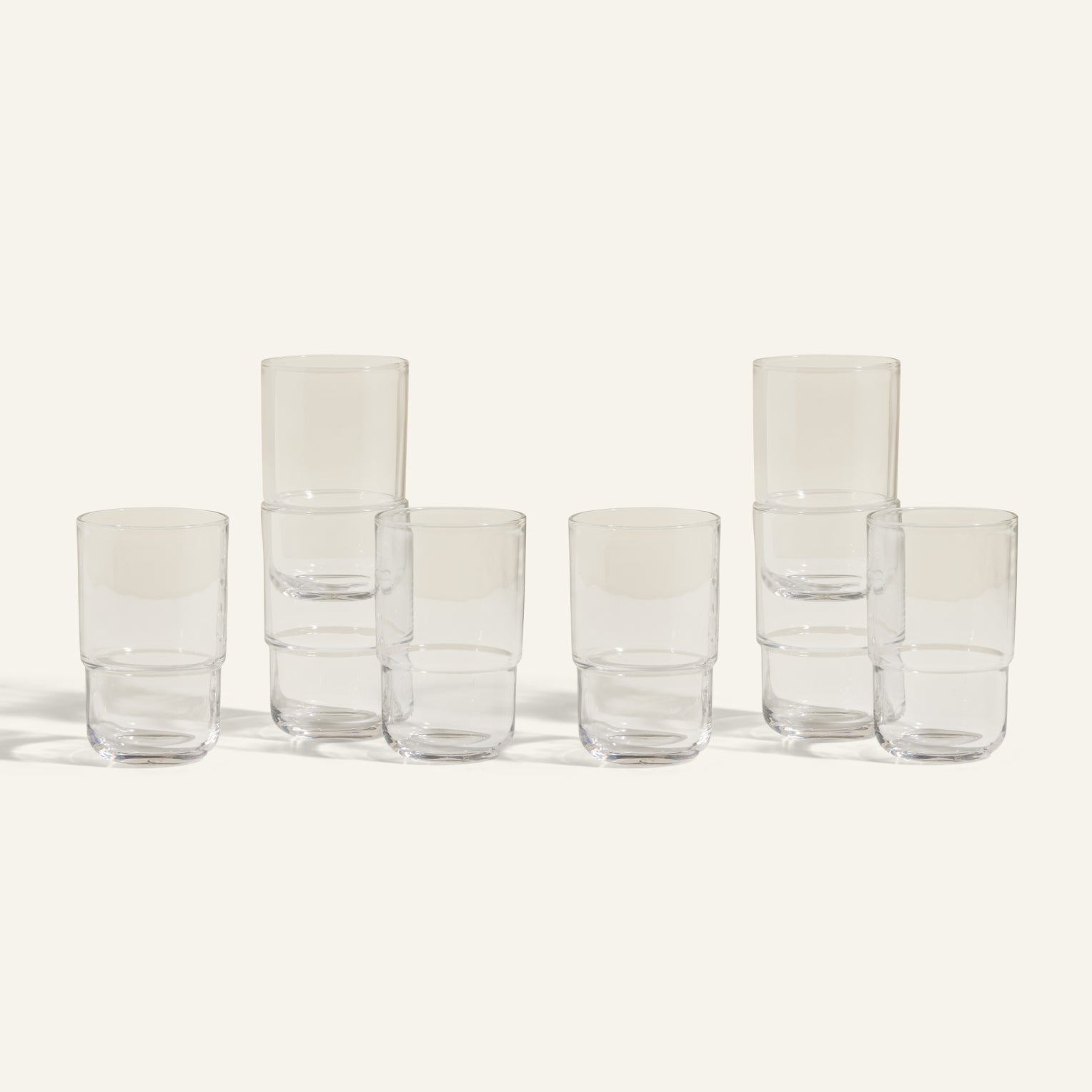 Eight Tall Night + Day Glasses, each 16 oz, are stacked in pairs and arranged in two rows of four on a plain light background.